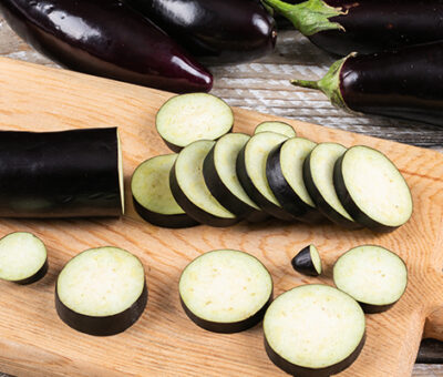 eggplant-chopped-one-cutting-board-wooden-side-view-2